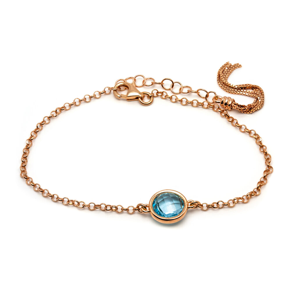 Gold-plated 925 silver bracelet with blue topaz stone. Thais Bernardes Jewellery