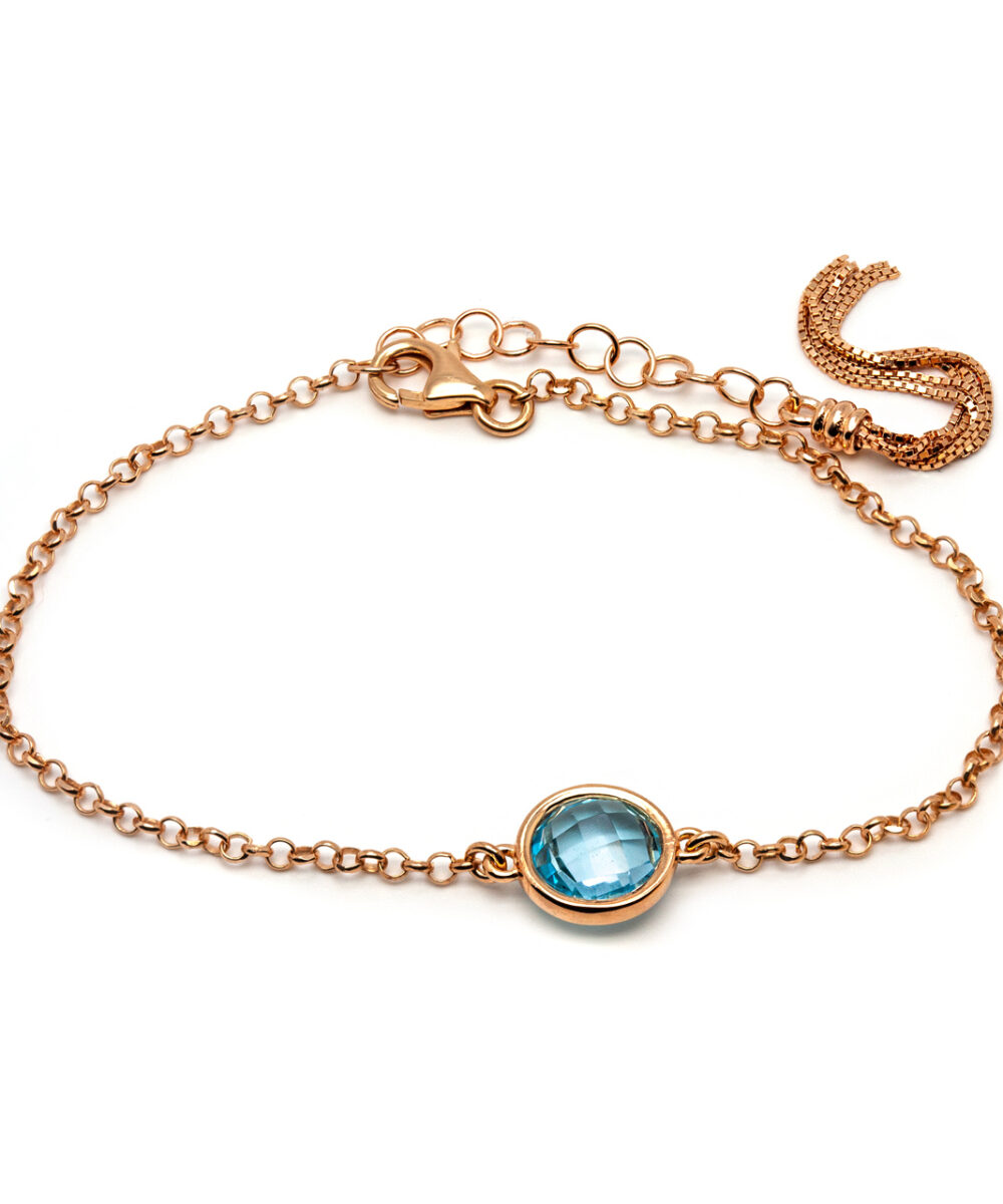 Gold-plated 925 silver bracelet with blue topaz stone. Thais Bernardes Jewellery